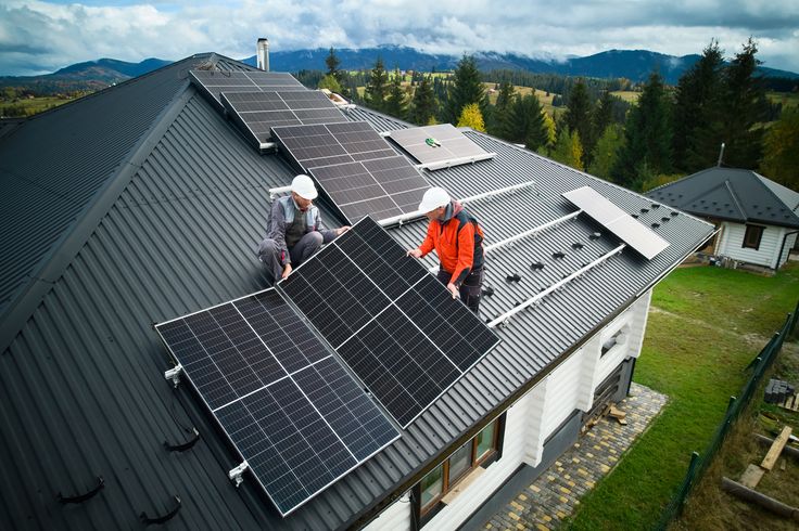 Engineers,Building,Photovoltaic,Solar,Module,Station,On,Roof,Of,House.